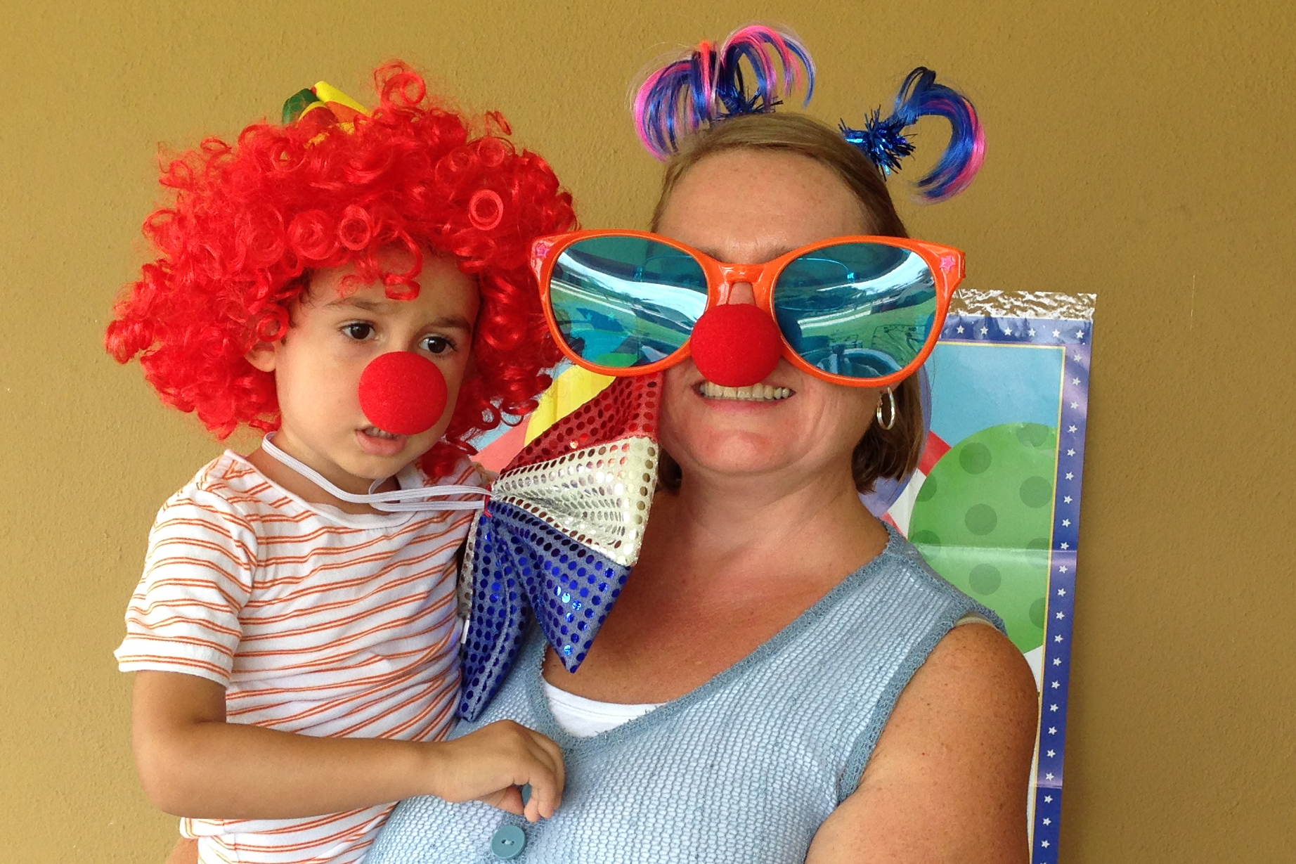 Carla McNab in clown garb with her grandson